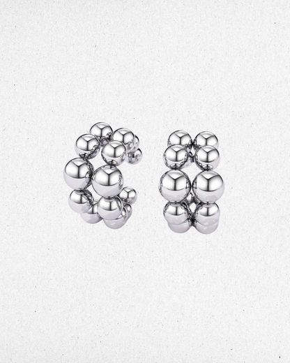 Boucle d'oreille faux conch