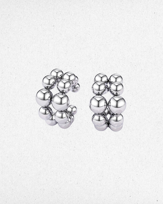 Boucle d'oreille faux conch